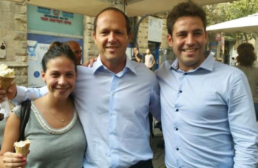 (from right) Ofer Berkowitz, Mayor Nir Barkat and city council member Einav Bar enjoy ice cream on Jaffa Road, in honor of Barkat’s birthday. As Berkowitz notes in the mid-October Facebook post, ‘It was also a chance to come out and support our dear businesses.’ (photo credit: FACEBOOK)
