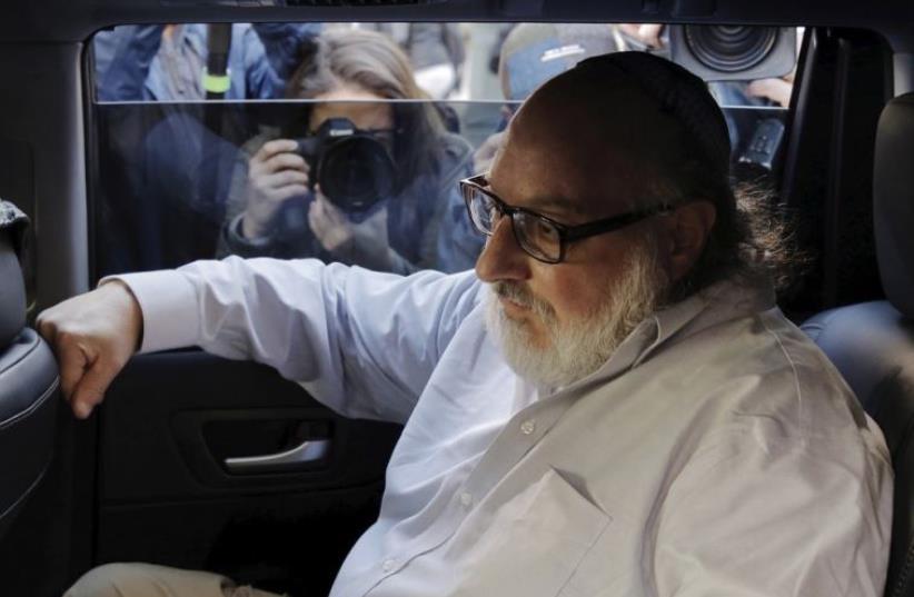 Israeli spy Jonathan Pollard leaves a federal courthouse in New York (photo credit: REUTERS)