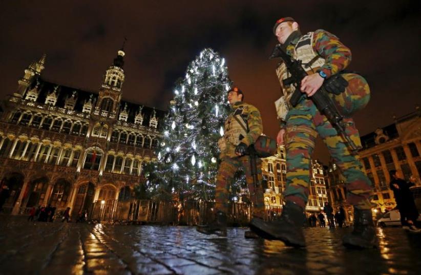 Belgian soldiers patrol Brussels' Grand Place on November 22, 2015 (photo credit: REUTERS)