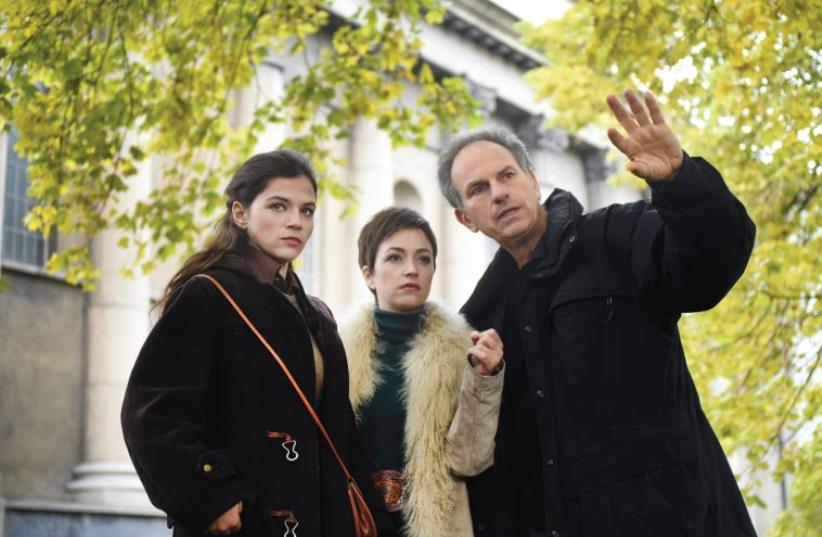 ACTRESSES JOY RIEGER (far left) and Nelly Tagar with director Avi Nesher on the set of ‘Past Life’ in Berlin. (photo credit: IRIS NESHER)