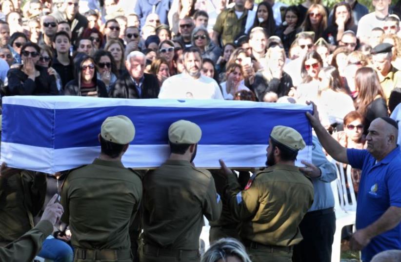 The funeral in Jerusalem Mt. Herzl Military cemetery of Ziv Mizrahi, 18, who was stabbed to death by a Palestinian assailant at the Dor Allon gas station on  Route 443 in the West Bank (photo credit: TOVAH LAZAROFF)