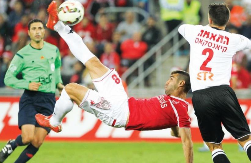 Hapoel Beersheba striker Shlomi Arbeitman’s bicycle-kick goal against Hapoel Haifa was the only time his team managed to score in the past two matches, a barren spell it will be aiming to end against Hapoel Kfar Saba on Saturday. (photo credit: DANNY MARON)