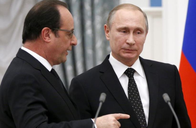 Russia's President Vladimir Putin (R) and his French counterpart Francois Hollande  (photo credit: REUTERS)