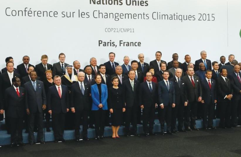 World leaders pose for a ‘family photo’ yesterday during the opening day of the World Climate Change Conference 2015 (COP21) at Le Bourget, near Paris (photo credit: REUTERS)