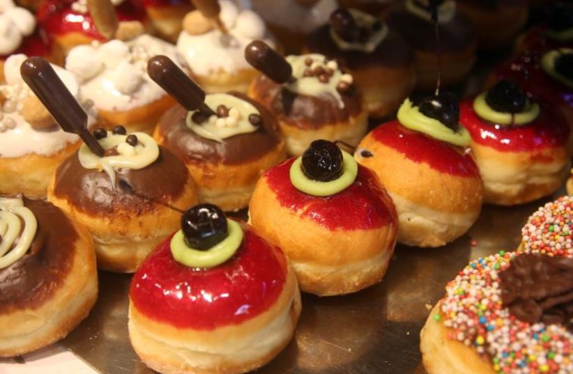 Sufganiot (Hanukka donuts) (photo credit: MARC ISRAEL SELLEM/THE JERUSALEM POST)