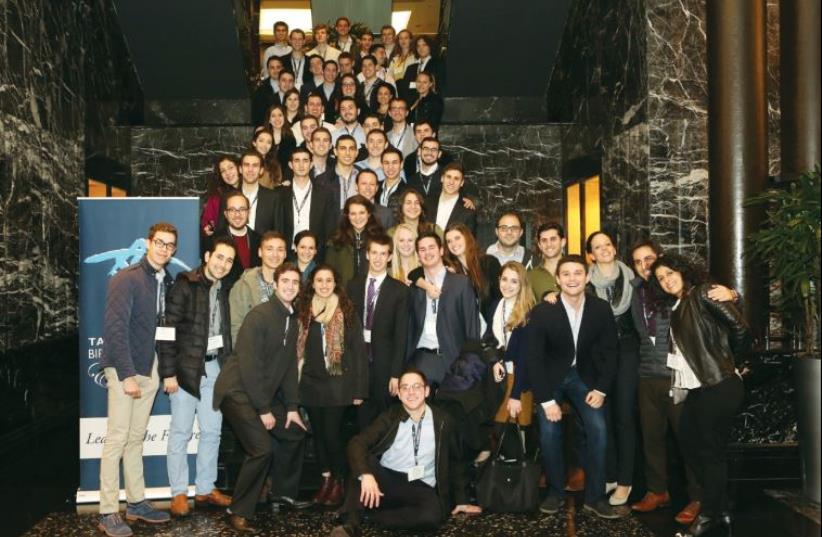 Participants from the professional internship program Birthright Excel take a group shot at a reunion in New York in October (photo credit: TAGLIT-BIRTHRIGHT)