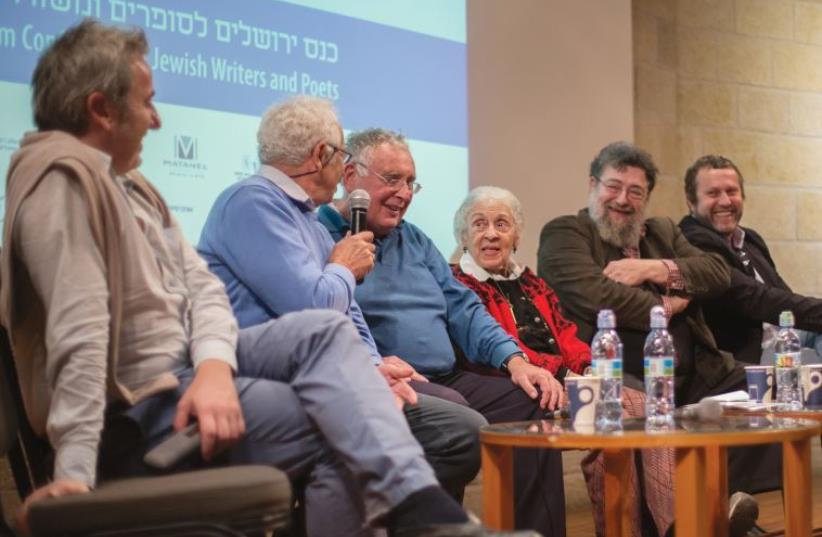 Gilles Rozier, Moyshe Lemster, Daniel Galay, Rivka Basman, Dov Ber Kerler and Velvl Chernin in conversation (photo credit: NA’AMA NOACH)