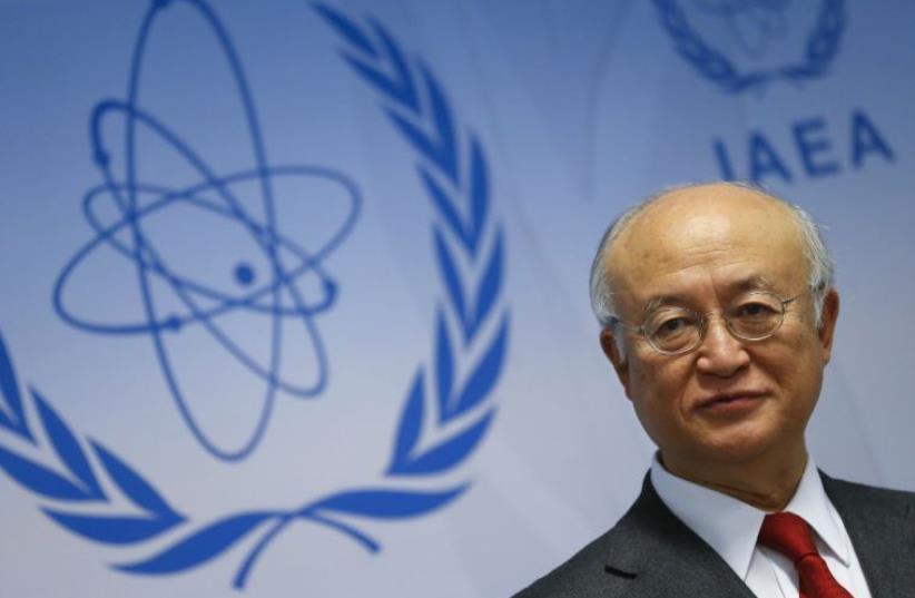 International Atomic Energy Agency (IAEA) Director General Yukiya Amano addresses a news conference after a board of governors meeting at IAEA headquarters in Vienna, which dealt with the Iran nuclear deal, November 26 (photo credit: REUTERS)