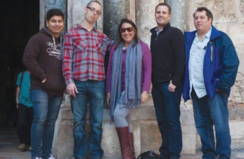 VISITING THE capital’s Old City are, from left, bloggers Utkarsh Lokesh, Terry Heick, Lisa Nielsen, David Wilson and Ronnie Burt. (photo credit: AMIT SHEMESH)