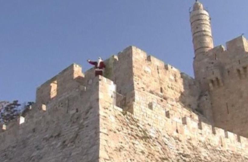 Jerusalem residents prepare for Christmas (photo credit: screenshot)