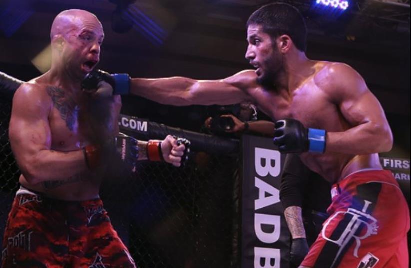 Israeli UFC fighter (right) Noad "Neo" Lahat with opponent (photo credit: NOAD "NEO" LAHAT FACEBOOK PAGE‏)