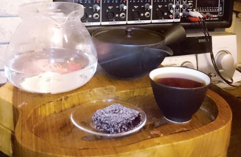 A spot of tea and a slice of blackberry-flavored pâté de fruit (photo credit: Courtesy)