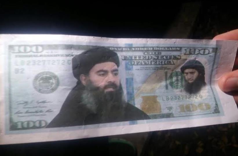 ISIS mock money found in North (photo credit: POLICE SPOKESPERSON'S UNIT)