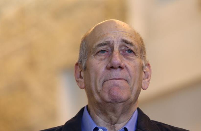 Former PM Ehud Olmert  (photo credit: AMIT SHABAY/POOL)