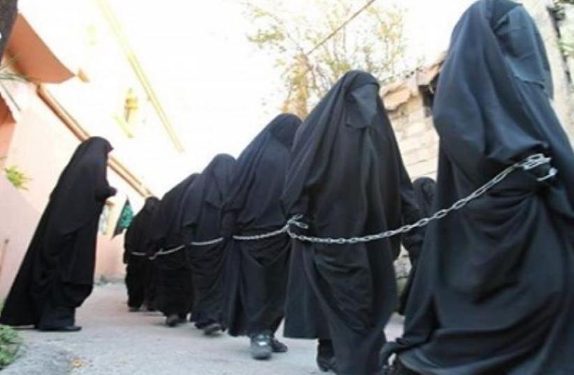 ISIS female slaves (photo credit: ARAB MEDIA)