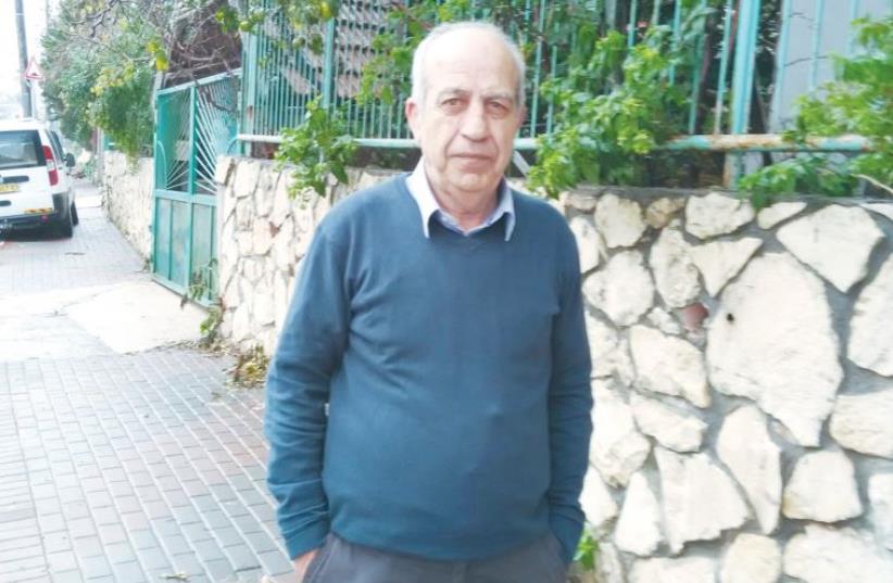 AHMAD MILHEM, a member of the Arara Local Council and a distant relative of the TA shooting suspect, speaks to ‘The Jerusalem Post’ yesterday. (photo credit: Ariel Ben Solomon)