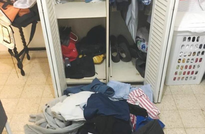 AHMAD AMER posted on Facebook Monday this photo of the mess that police allegedly left in his Ramat Aviv apartment, after searching it for the fugitive Tel Aviv shooting suspect (photo credit: FACEBOOK)