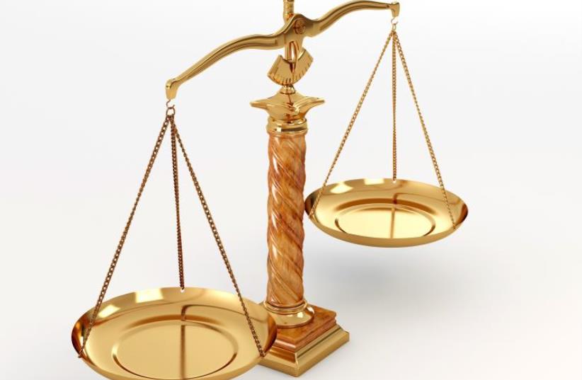 Scales of Justice symbol (photo credit: INGIMAGE)