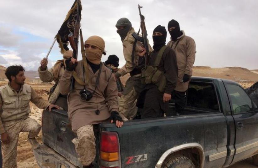 Al-Qaida militants. (photo credit: REUTERS)