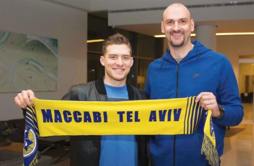 RETURNING Maccabi Tel Aviv guard Gal Mekel (left) said he is looking forward to working with coach Zan Tabak after signing a three-and-a-half year contract with team (photo credit: MACCABI TEL AVIV WEBSITE)