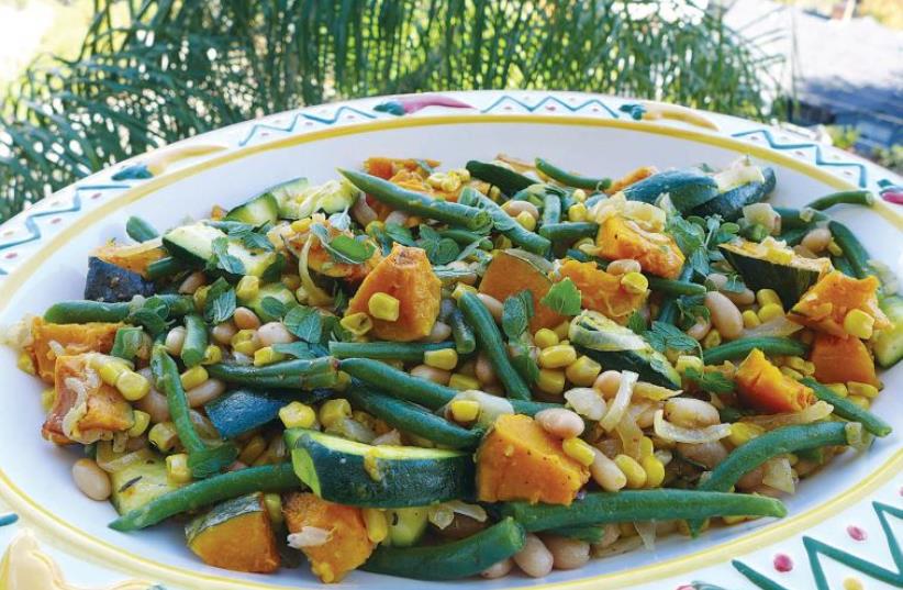 Three sisters casserole with two kinds of squash, corn and two kinds of beans (photo credit: YAKIR LEVY)