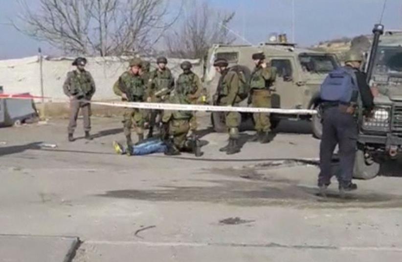 Security forces shoot, kill suspected terrorist in thwarted knife attack in West Bank (photo credit: screenshot)