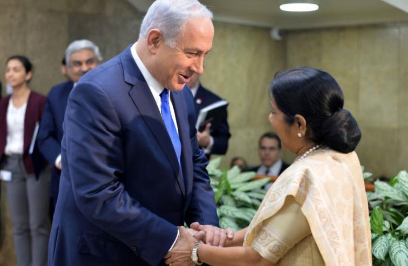 Indian External Affairs Minister Sushma Swaraj with Prime Minister Benjamin Netanyahu ‏ (photo credit: KOBI GIDEON/GPO)