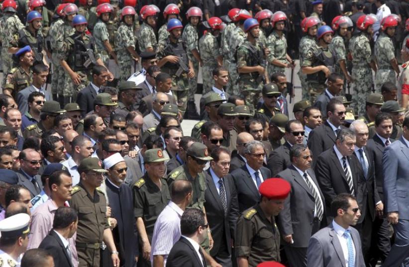 The funeral of Egyptian soliders killed during the Sinai attack on August 5, 2012 (photo credit: REUTERS)