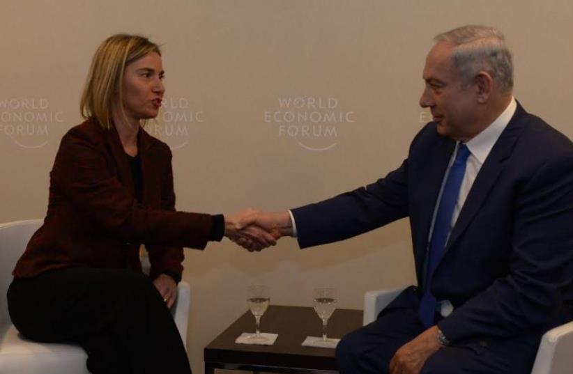  European Union foreign policy chief Federica Mogherini with Prime Minister Benjamin Netanyahu in Davos, January 21, 2015 (photo credit: PMO)