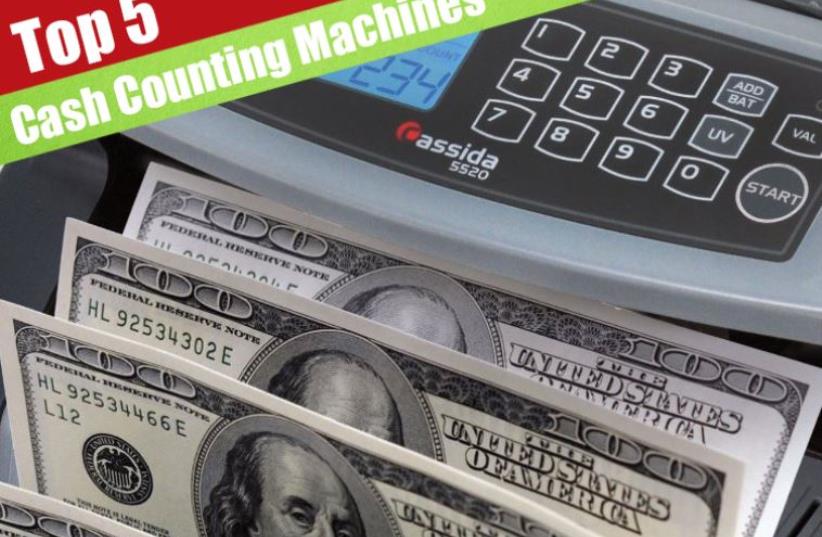 money counting machine (photo credit: PR)