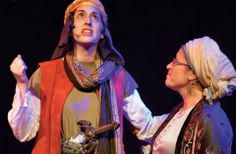 Tzelofchad and his wife, in the all-female theater company’s ninth Bible-based musical show, ‘Sisters! The Daughters of Tzelofchad.’ (photo credit: ESTY HOLLAND)
