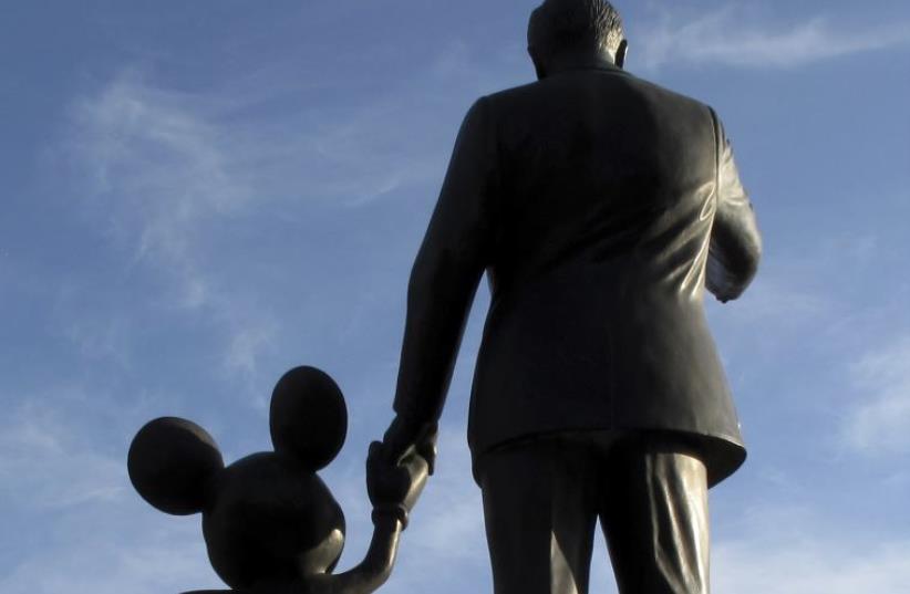 Statues of Walt Disney and Mickey Mouse (photo credit: REUTERS)