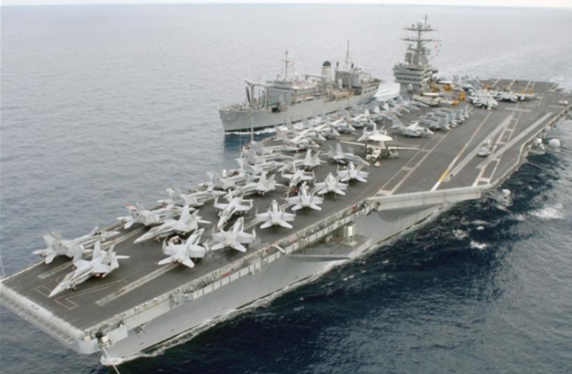 Iranian drone spies on US naval carrier (photo credit: FARS NEWS AGENCY/ EBRAHIM NOROOZI)