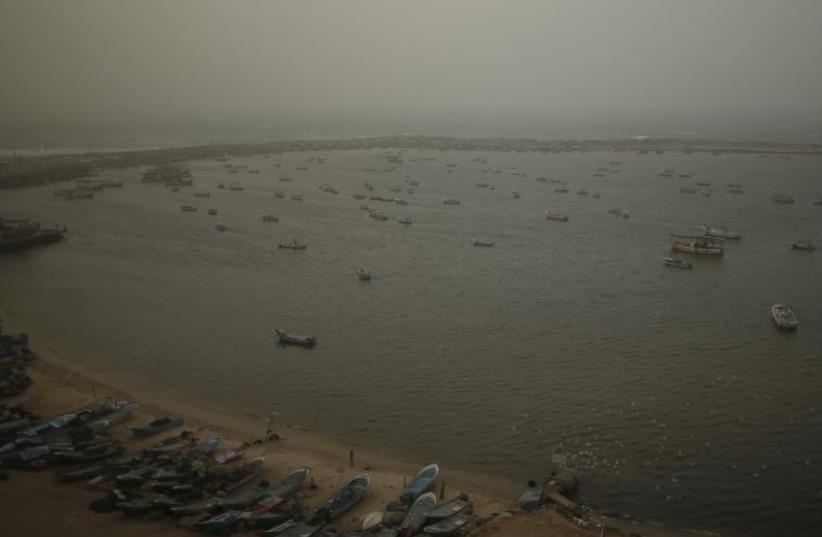 A view shows fishing boats at the seaport of Gaza City on a stormy day January 18, 2016. (photo credit: REUTERS)