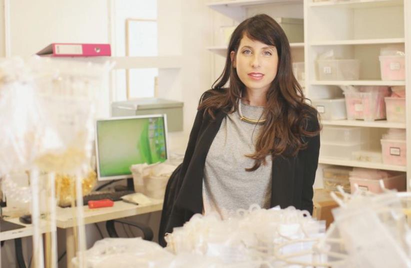 ‘I LOVE that it’s creative and what I do is about making people happy and about giving people something that they enjoy and have fun wearing and using. That’s the best for me,’ says local jewelry designer Shlomit Ofir.  (photo credit: Courtesy)