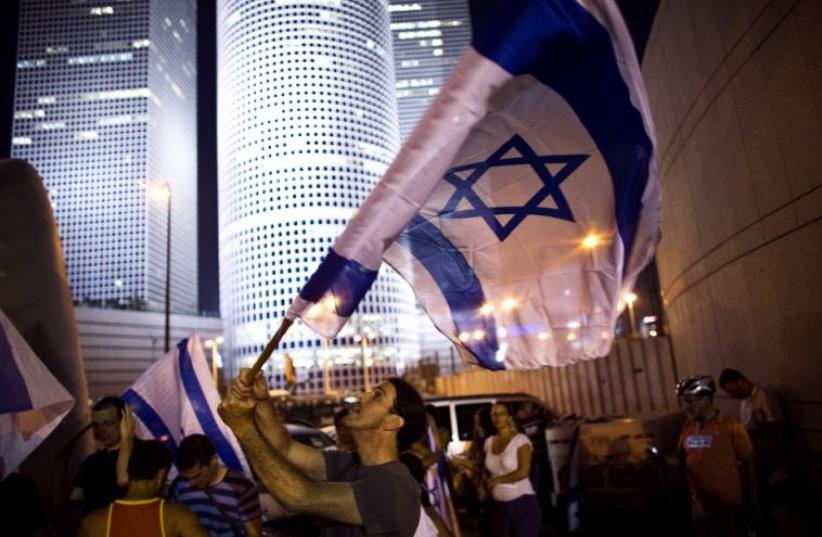 Israelis demonstrate in support of the 2014 war in Gaza (photo credit: REUTERS)
