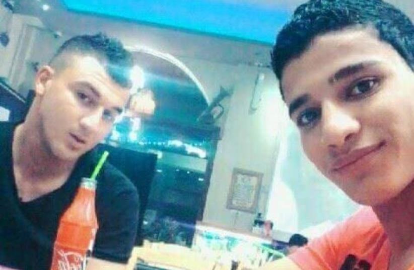 Ahmed Zakarneh and Mohamed Kmail, two of the Palestinian assailants involved in the Jerusalem attack (photo credit: FACEBOOK)