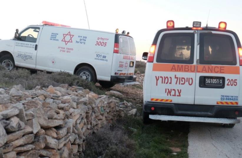 Ambulances at scene of terror attack in West Bank settlement of Naveh Daniel (photo credit: MDA)