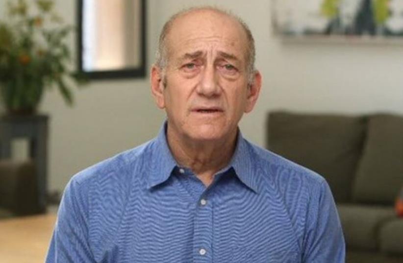 Ehud Olmert tapes a statement prior to his entering prison (photo credit: Courtesy)