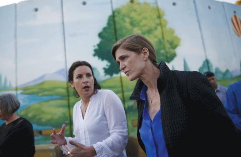 SAMANTHA POWER, the US ambassador to the UN, speaks with a local resident yesterday during a visit to the area of Israel along the Gaza border. (photo credit: REUTERS/AMIR COHEN)