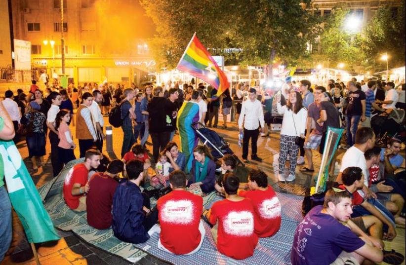 A ‘Thursday night encounter’ in Zion Square, in which young people from all over the political map gather to just listen to each other and talk (photo credit: Courtesy)