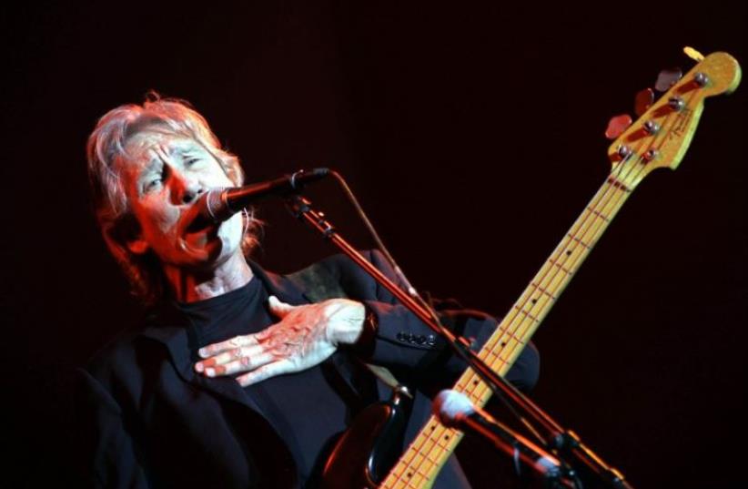 Roger Waters performs during a concert in Neveh Shalom, Israel in 2006 (photo credit: AFP PHOTO)