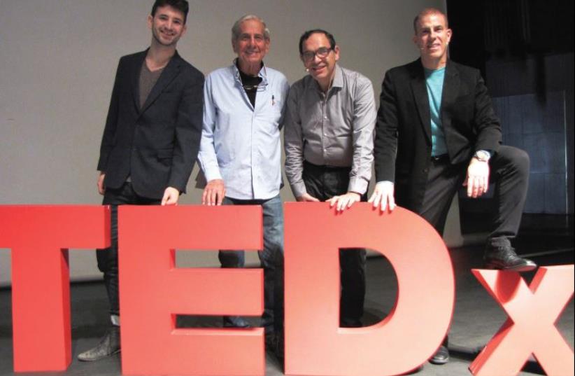 (From left) The young Yadin Soffer, actor Chaim Topol, former education minister Shai Piron and journalist Gilad Adin at the TEDx Talks at TAU on February 15 (photo credit: RAMI ZARNAGAR)