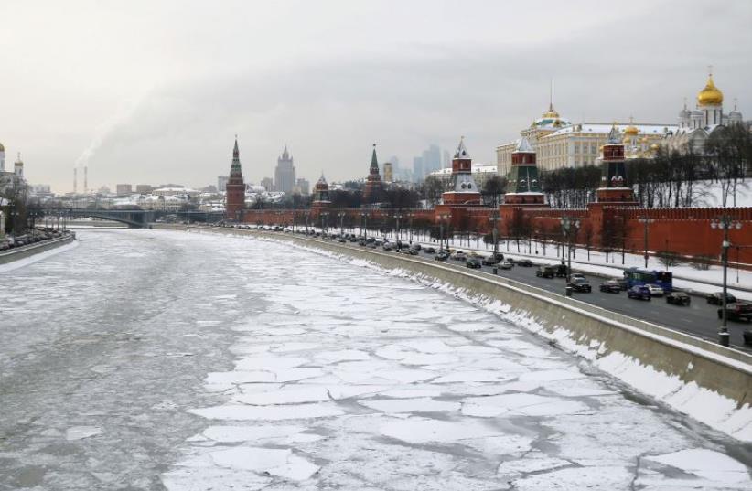 AN ICE floe drifts past the Kremlin in Moscow in winter. (photo credit: REUTERS)