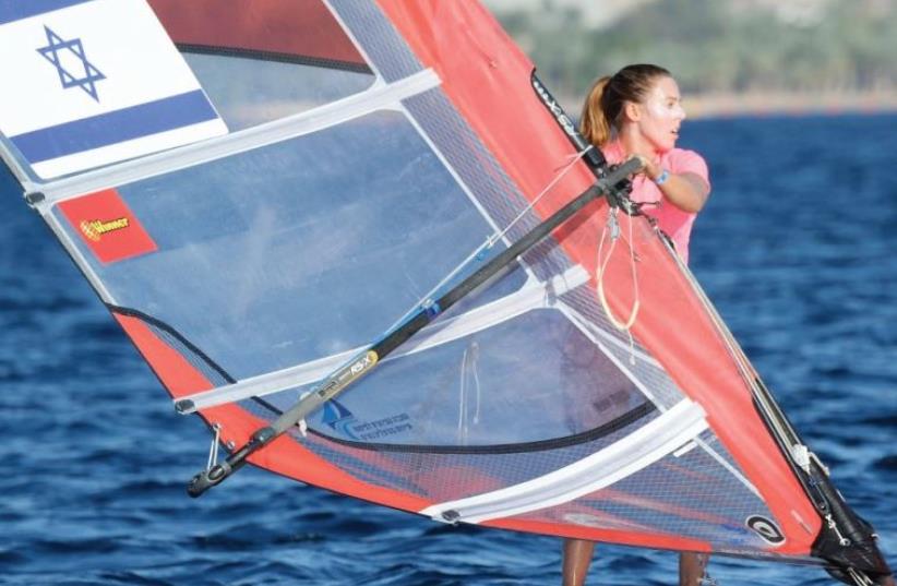 Noga Geller climbed up to fourth place in the women’s competition at the 2016 RS:X windsurfing World Championships yesterday after an impressive performance in the second day of the event in Eilat. (photo credit: AMIT SHISEL)