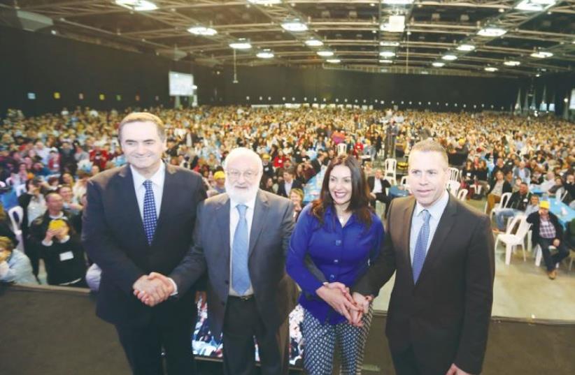 Some 6,000 participants from 62 countries express support last night for Israel at a Kabbala conference at the Tel Aviv Fairgrounds. Guests of honor are, from left, Transportation Minister Israel Katz, conference speaker Rabbi Michael Laitman, Culture and Sport Minister Miri Regev, and Public Securi (photo credit: ASHER BITON)