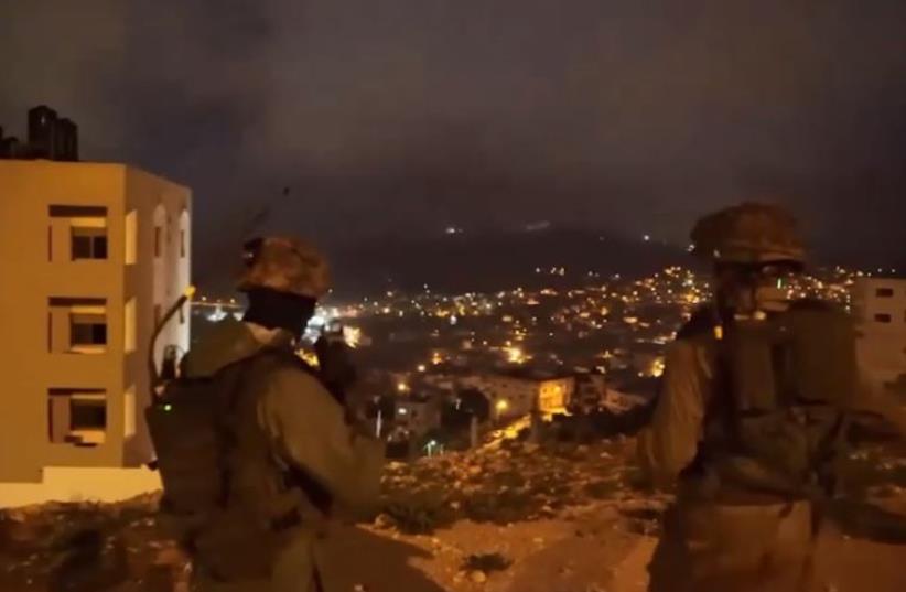 IDF seizes illegal weapons in West Bank raid (photo credit: screenshot)