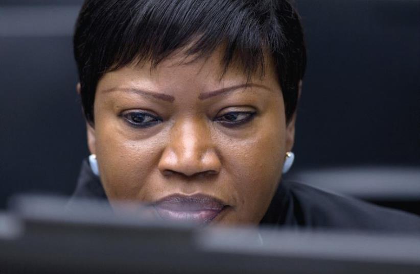 PROSECUTOR FATOU BENSOUDA waits for the start of the trial against former Ivory Coast president Laurent Gbagbo and former youth minister Charles Ble Goude at the International Criminal Court in The Hague last month. (photo credit: PETER DEJONG/REUTERS)