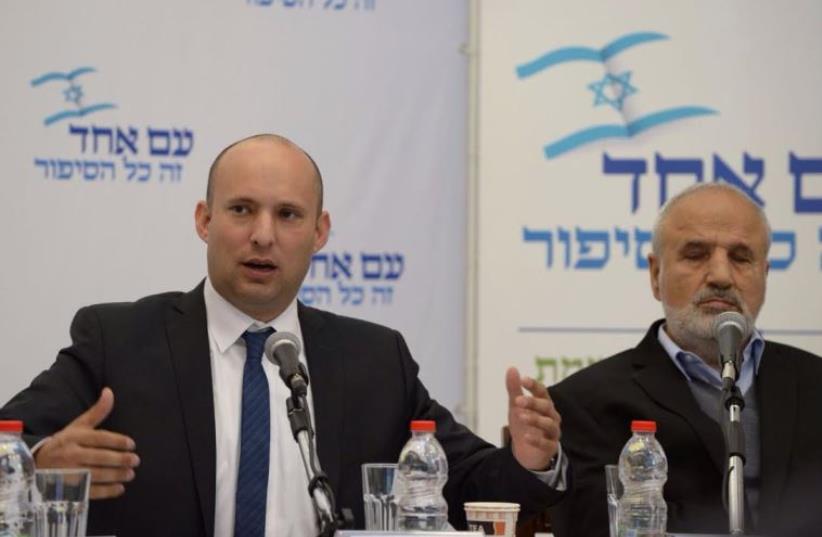Education Minister Naftali Bennett and Israel Prize laureate Erez Biton.  (photo credit: Courtesy)