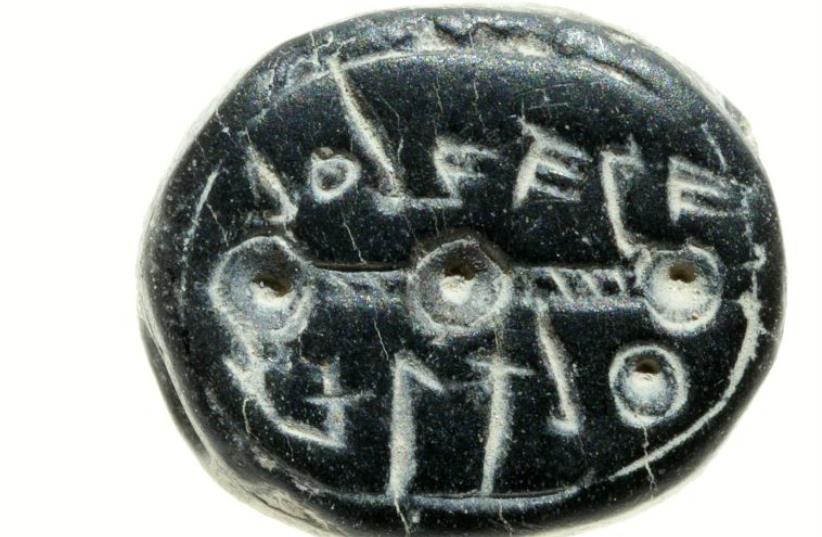 The rare seal belonging to a woman during the First Temple Period bearing the inscription: “To Elihana bat Gael.”  (photo credit: CLARA AMIT, COURTESY OF THE ISRAEL ANTIQUITIES AUTHORITY)
